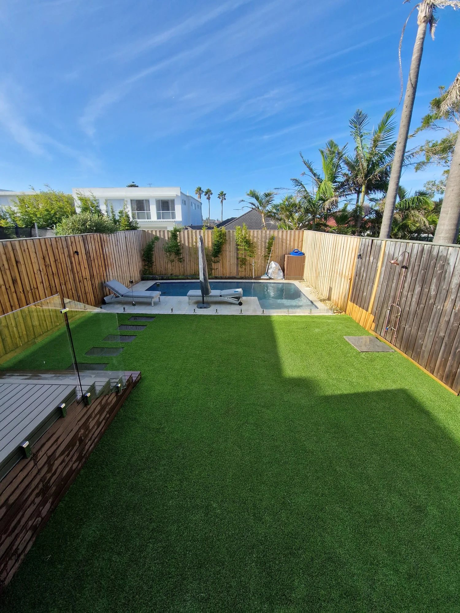 Artificial turf poolside and alfresco area
